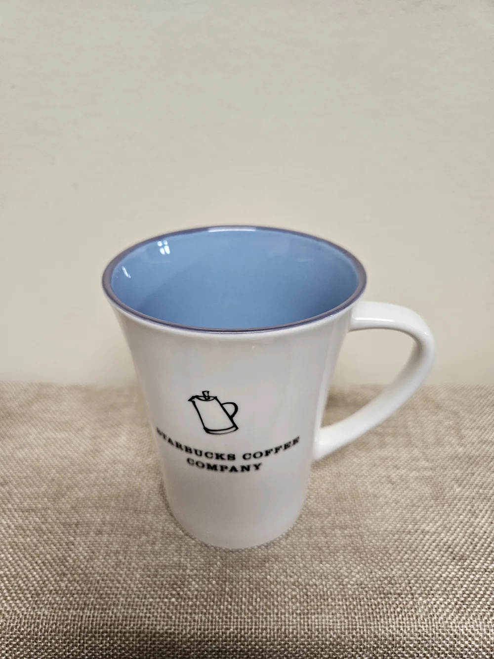 2006 Starbucks Ceramic Coffee Mug with Black Logo Blue Interior & Purple Rim